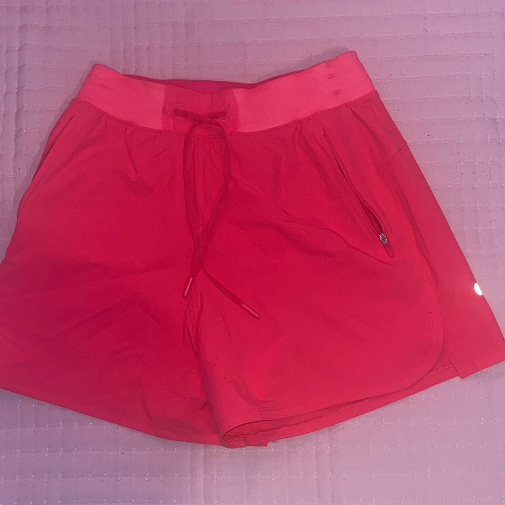 Lululemon license to train high rise shorts in shade lipgloss